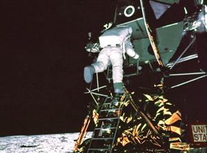 The astronaut appears to be illuminated from below.